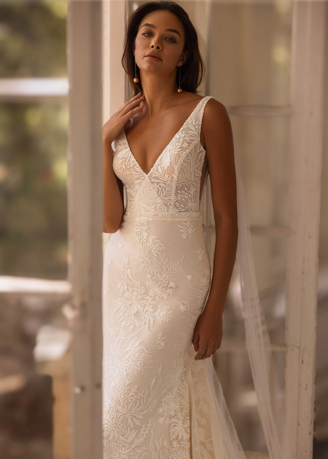 Bruna by Elly Bride fitted lace wedding dress with deep V-neck and botanical lace detailing