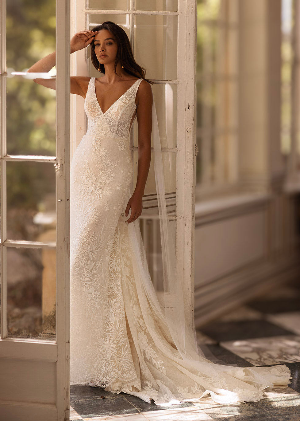 Bruna by Elly Bride fitted lace wedding dress with deep V-neck and botanical lace detailing