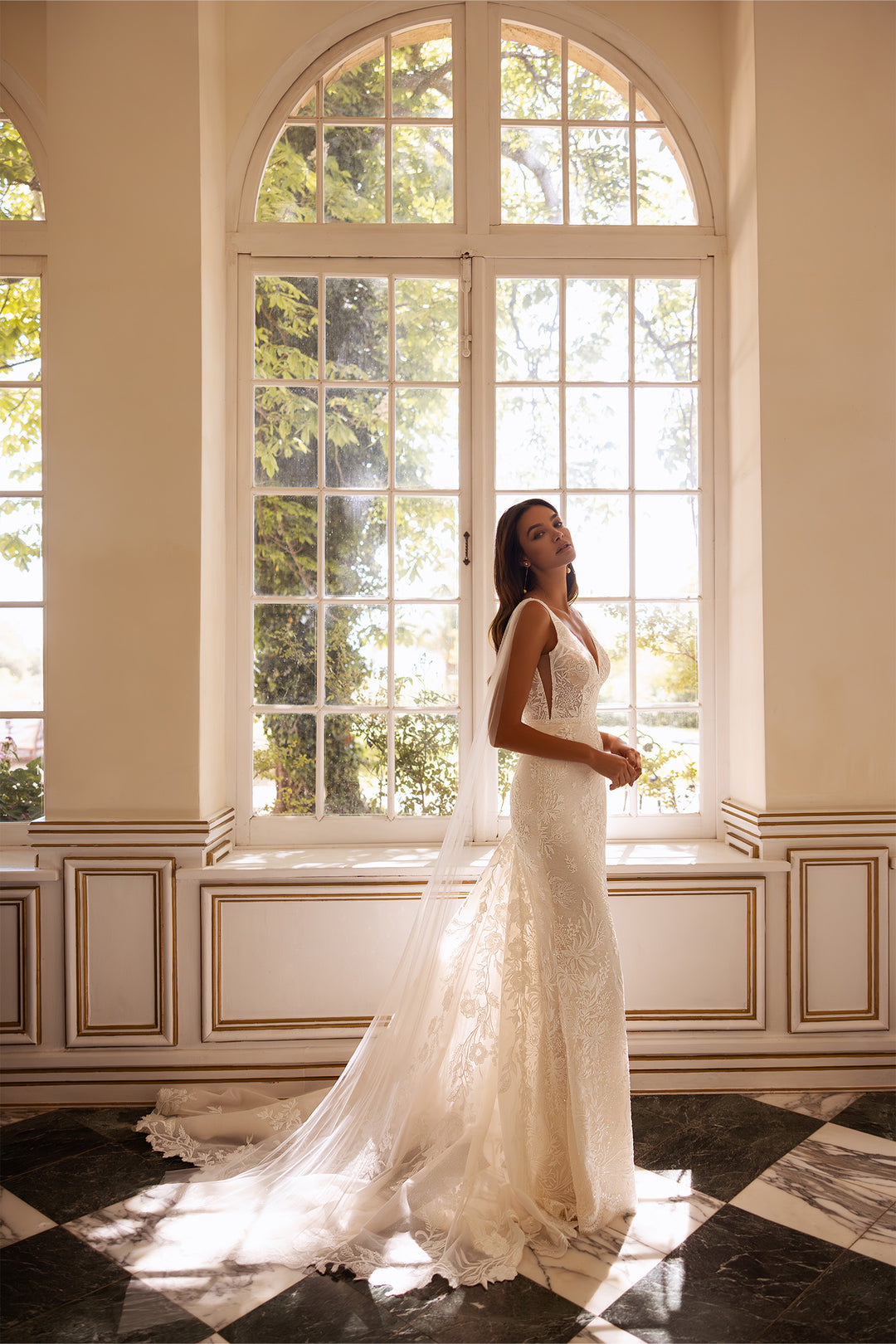 Bruna by Elly Bride | All-over Lace Mermaid Wedding Dress, Sheer side panels, Side View | The Laid Back Bride