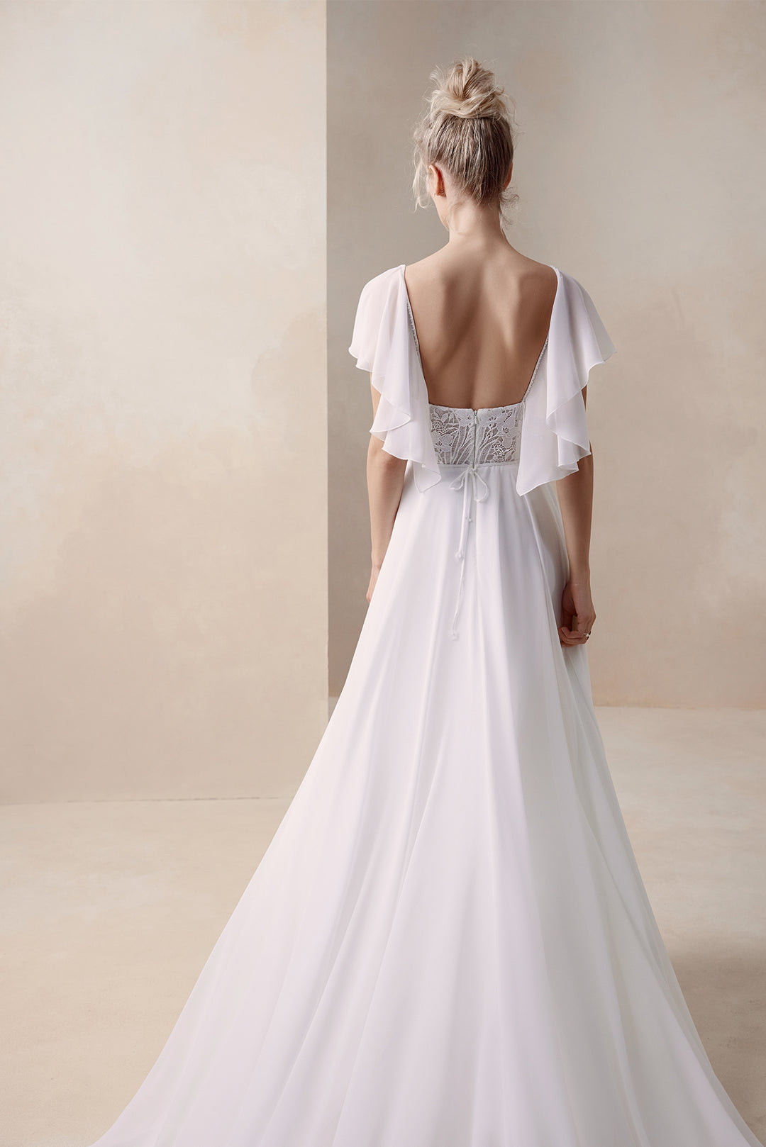 Elma by Elly Bride | Minimalist A-line Wedding Dress, Open Back, Flutter Sleeves, Modern Lace Bodice, Up Close Back View | The Laid Back Bride