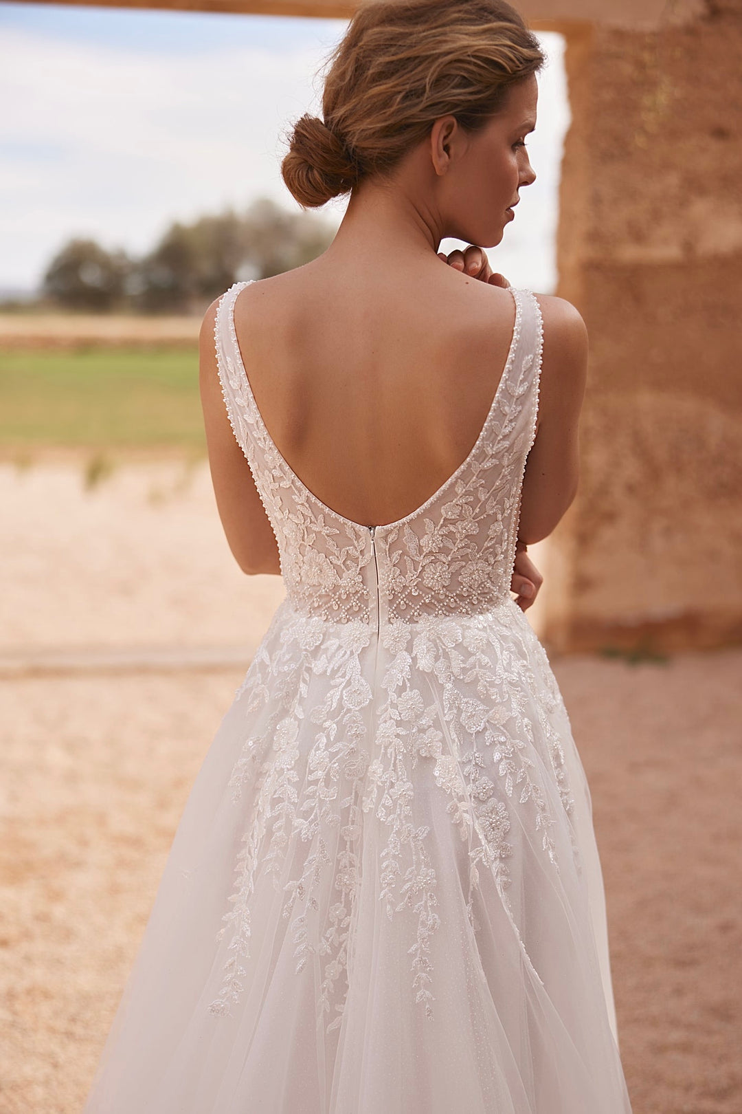 Harper by Elly Bride | Ethereal A-line Wedding Dress, Curved back, Botanical lace detailing, Up Close Back View | The Laid Back Bride