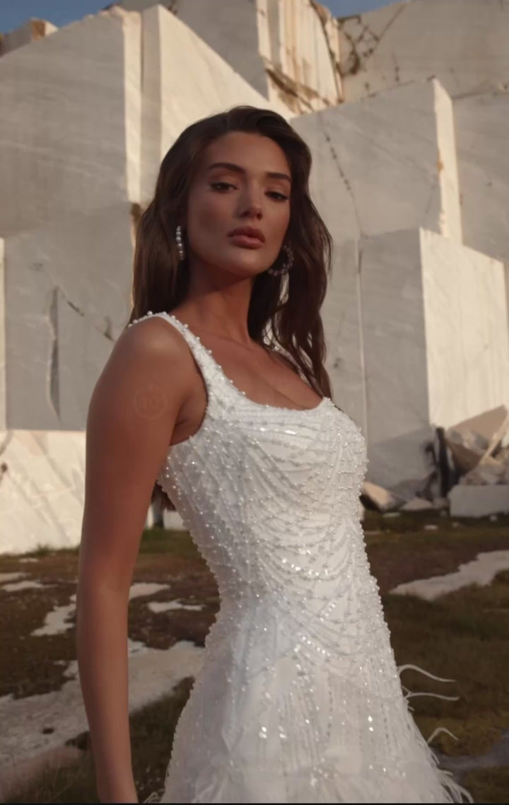 Short video of woman wearing wedding reception mini dress, Ivelia by Katy Corso.