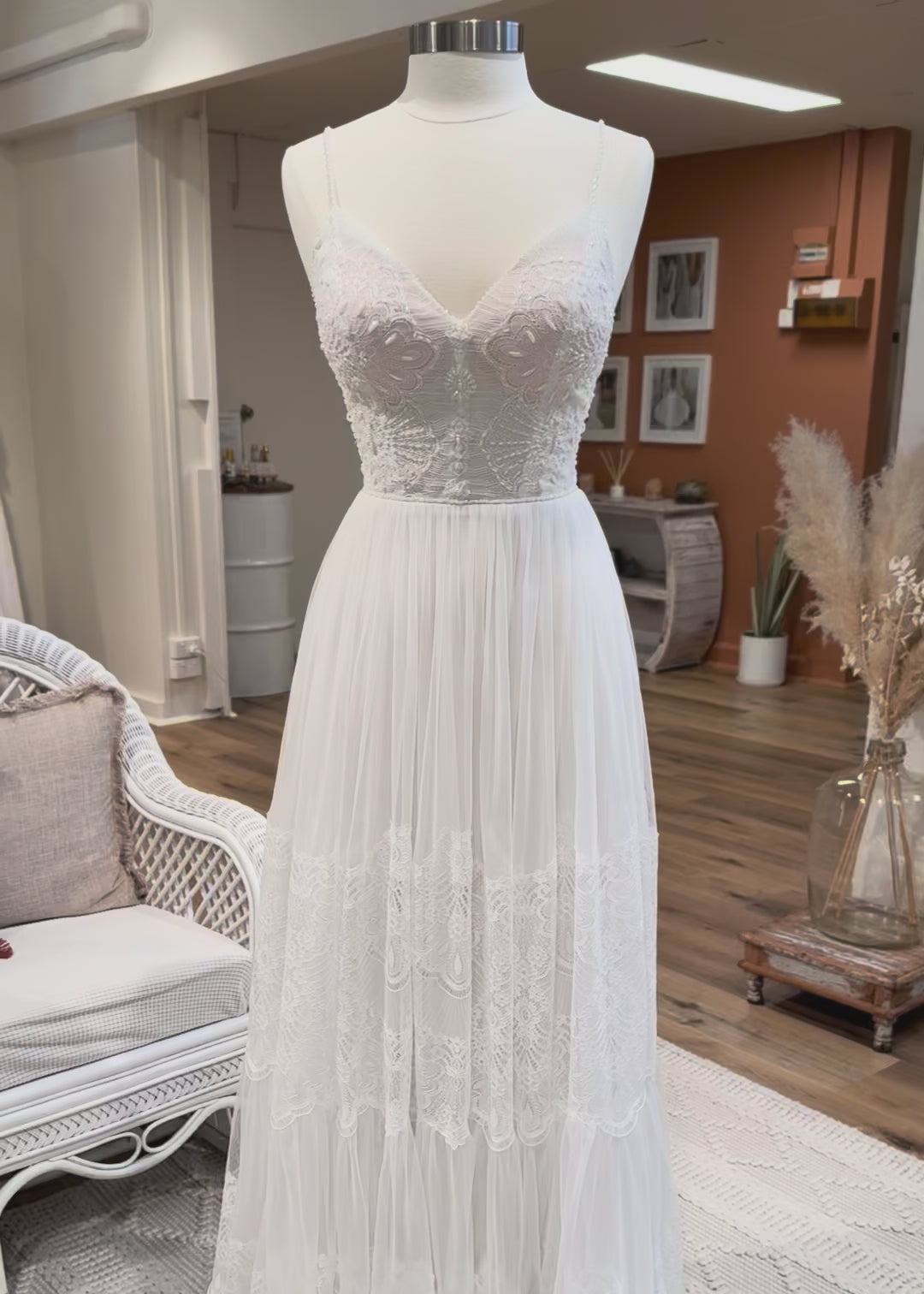 Short video of the Frida by Nataliya Vilchuk gown on a mannequin in a bridal store.